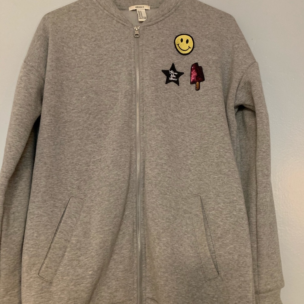 Grey jacket with patches